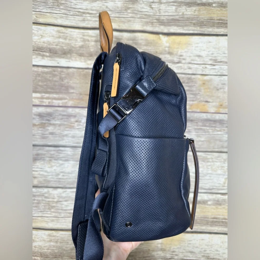 Tumi Navy Perforated Leather Backpack with Tan Handles